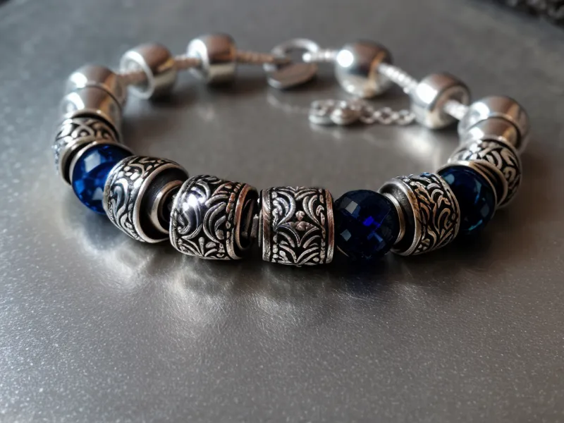 Silver charm bracelet stored safely in a velvet-lined jewelry box